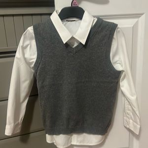 White shirt and grey sweater vest